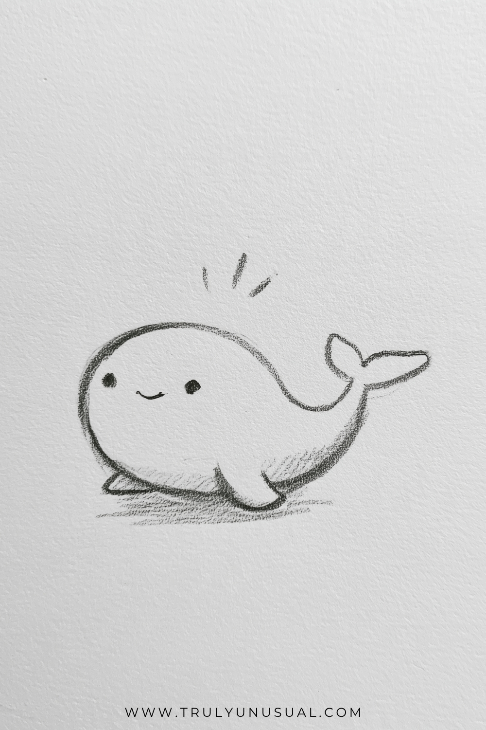 Simple pencil doodle of a smiling whale facing left, with a rounded body, small dark eyes, and little flippers beneath its belly. Its back narrows into a raised tail with two pointed flukes, and three short accent marks appear above its head.