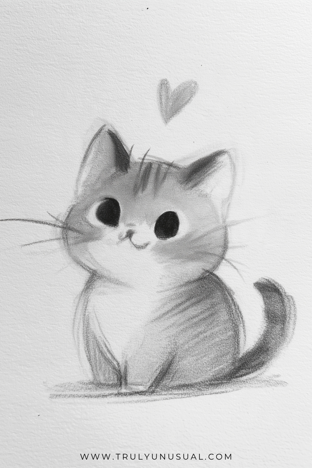 Soft pencil drawing of a seated tabby kitten with oversized dark eyes, a tiny nose, a curved mouth, and long whiskers. Dark stripes mark its forehead and sides around a pale muzzle and chest, while its tail curls upward on the right and a small shaded heart floats above its head.