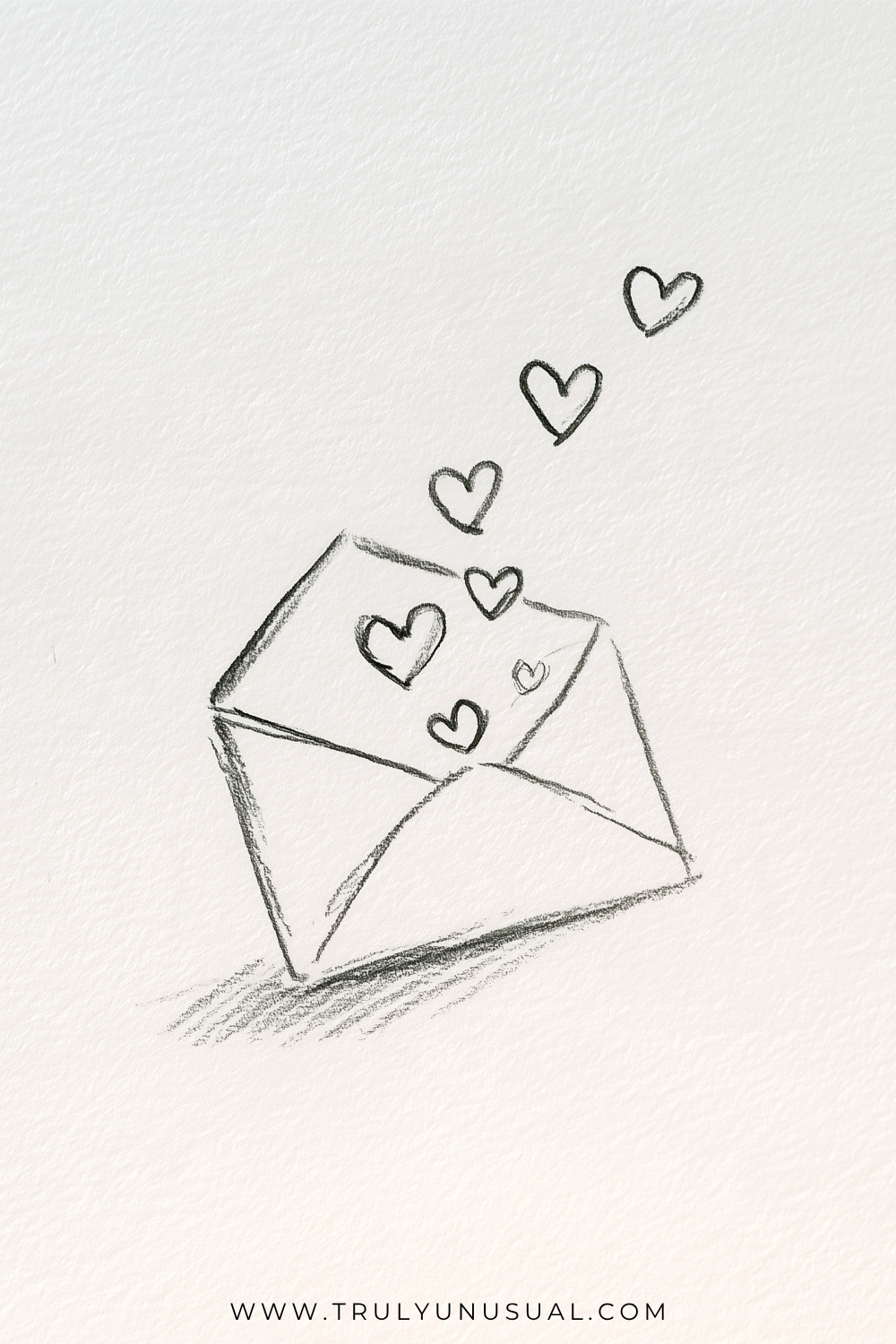 Pencil drawing of an open envelope tilted diagonally on textured white paper. Triangular folds form the front pocket and raised flap, with outlined hearts inside the opening and a loose trail of hearts rising towards the upper right. A short hatched shadow falls below and to the left.