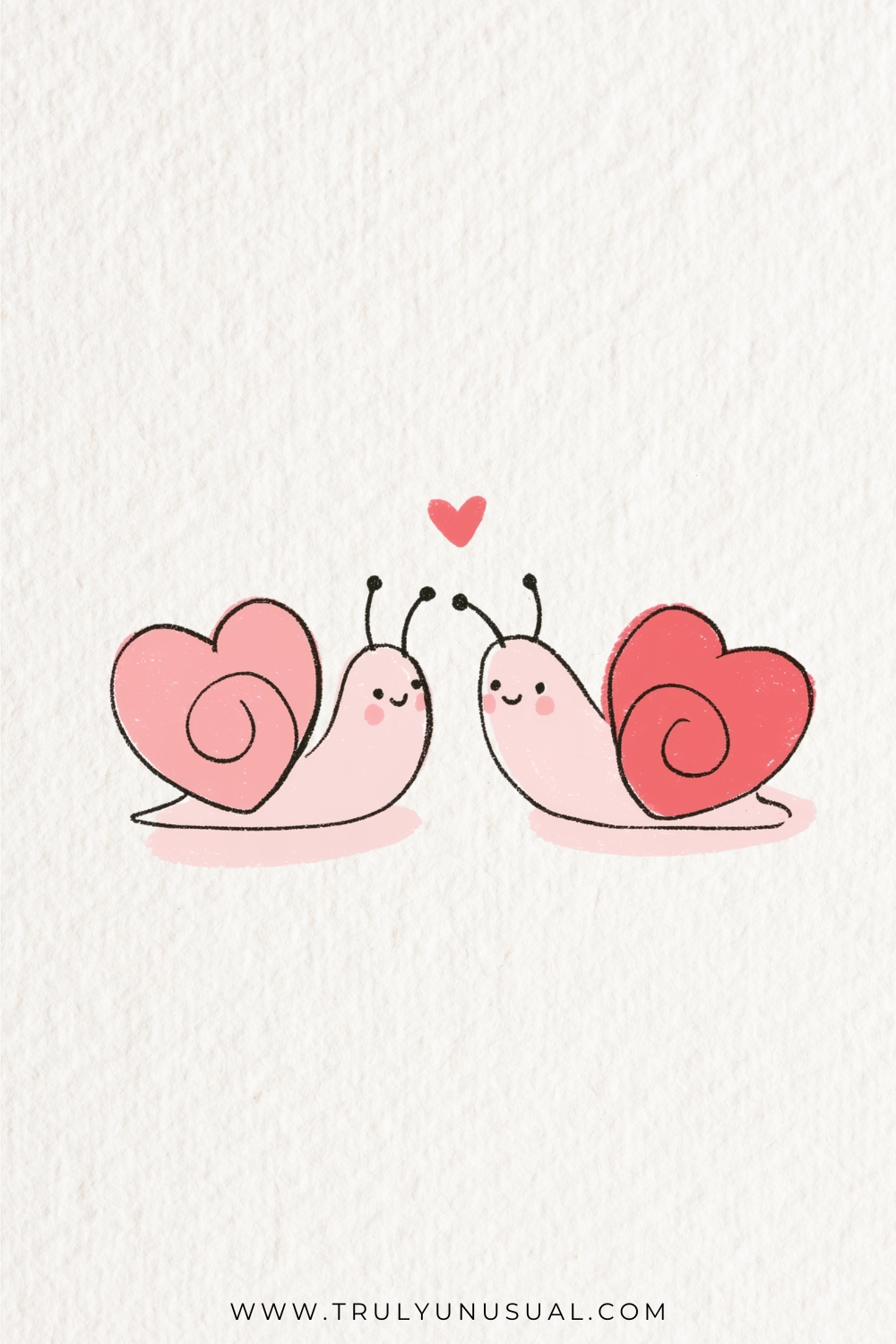 Two pink cartoon snails face one another with raised heads and curved feelers. Their large heart-shaped shells contain spirals, pale pink on the left and red on the right; rosy cheeks, pink ground shading and a floating red heart complete the scene.